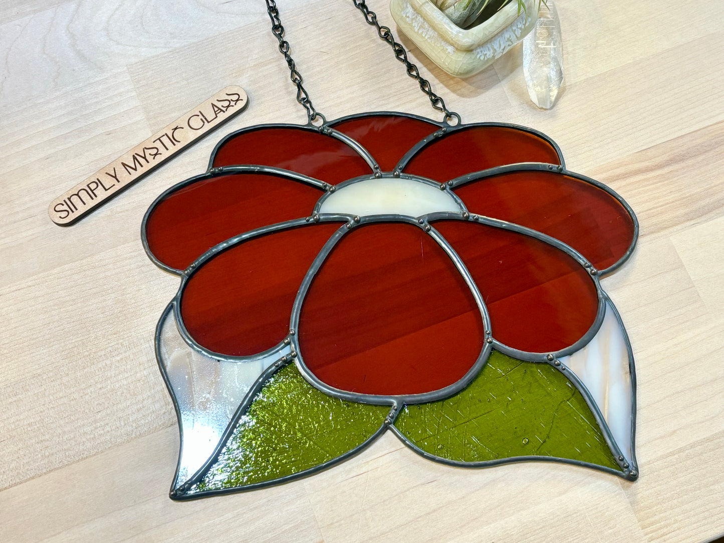 Burnt orange stained glass flower