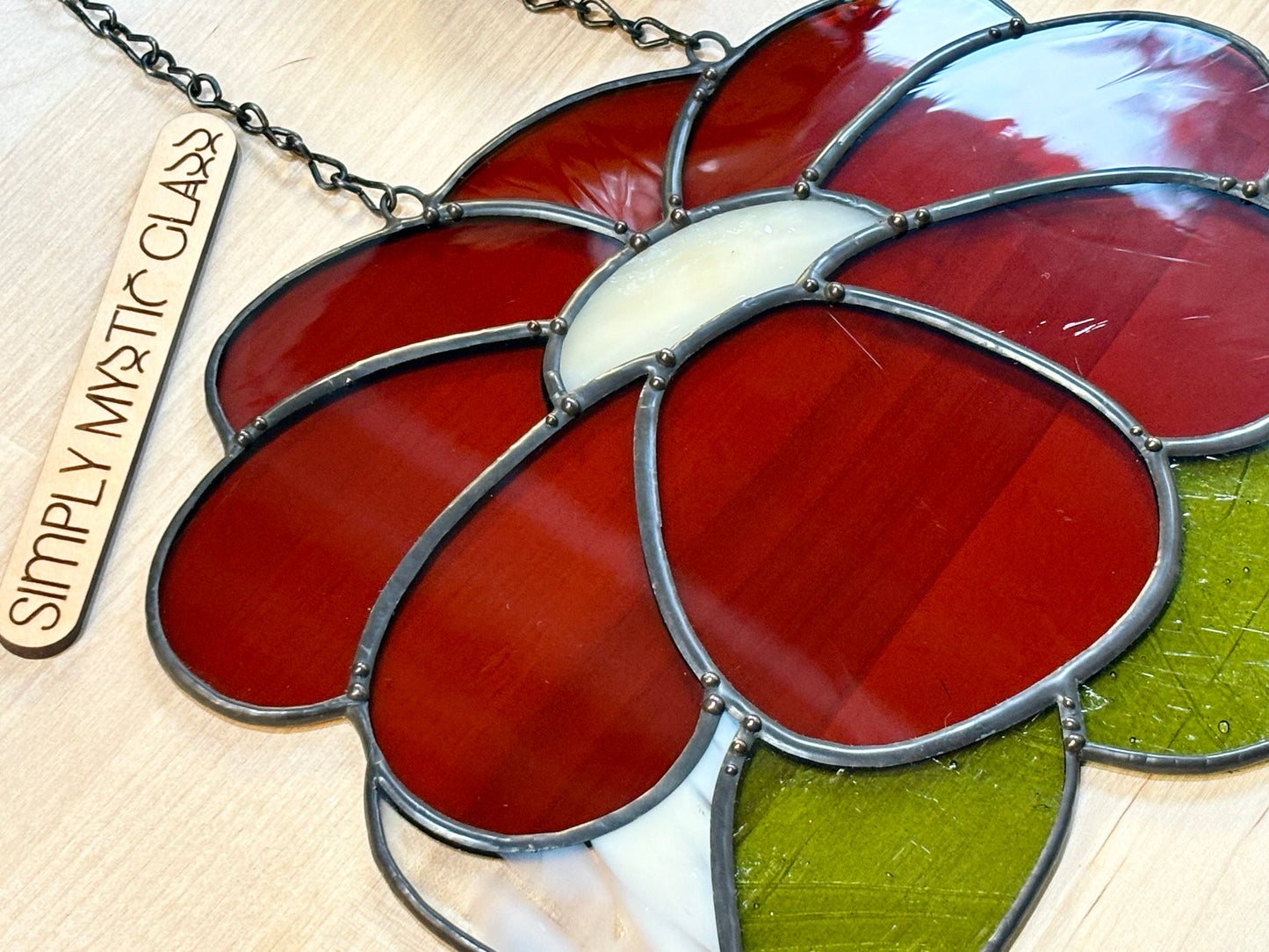 Burnt orange stained glass flower